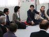 Photograph of the Prime Minister having talks with the residents of temporary housing in Watari Town