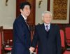 Photograph of Prime Minister Abe shaking hands with the General Secretary of the Communist Party of Viet Nam, Dr. Nguyen Phu Trong