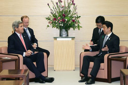 Photograph of Prime Minister Abe receiving a courtesy call from the Secretary of State of the United States, Mr. John F. Kerry