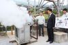 Photograph of the Prime Minister observing the operations of a power generation system utilizing hot spring water and steam 1