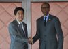Photograph of Prime Minister Abe shaking hands with President of the Republic of Rwanda Paul Kagame