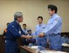 Photograph of Prime Minister Abe receiving a letter of request from the Deputy Governor of Shimane Prefecture, Mr. Junichi Kobayashi