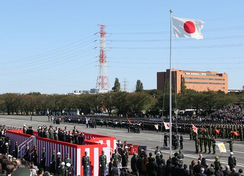 Photograph of the raising of the national flag