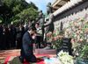 Photograph of the Prime Minister offering flowers at a memorial (2)