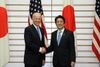 Photograph of Prime Minister Abe shaking hands with the Hon Joseph R. Biden Jr., Vice President of the United States of America (1)
