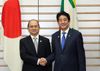 Photograph of Prime Minister Abe shaking hands with H.E. Mr. Thein Sein, President of the Republic of the Union of Myanmar