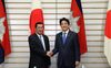 Photograph of Prime Minister Abe shaking hands with H.E. Mr. Samdech Hun Sen, Prime Minister of the Kingdom of Cambodia