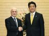 Photograph of Prime Minister Abe shaking hands with H.E. Dr. Hussain Al-Shahristani, Deputy Prime Minister of the Republic of Iraq