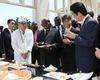 Photograph of the leaders sampling food at the Japanese food exhibition (2)