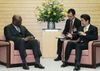 Photograph of Prime Minister Abe receiving a courtesy call from H.E. Dr. John William Ashe, President of the 68th Session of the United Nations General Assembly