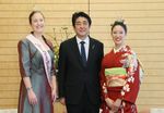 Photograph of the Prime Minister receiving the courtesy call from the Hamburg Cherry Blossom Princess and the Japan Cherry Blossom Queen
