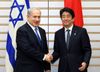 Photograph of Prime Minister Abe shaking hands with H.E. Mr. Benjamin Netanyahu, Prime Minister of the State of Israel