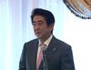 Photograph of Prime Minister Abe extending words of encouragement to Japanese staff of international organizations