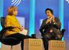 Photograph of Prime Minister Abe talking with Ms. Hillary Clinton during an event on women’s issues at the Clinton Foundation