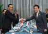 Photograph of Prime Minister Abe shaking hands with the President of Indonesia
