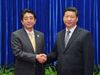 Photograph of Prime Minister Abe shaking hands with the President of China (2)