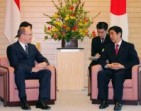 Photograph of Prime Minister Abe enjoying talks with His Serene Highness Prince Albert II of Monaco