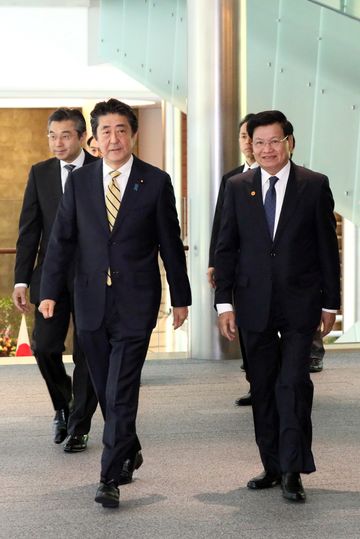 Photograph of the leaders heading to the signing ceremony
