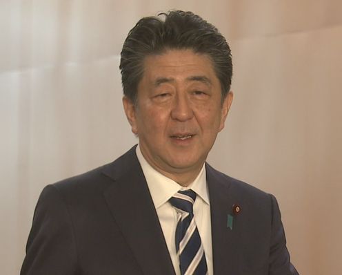 Photograph of the Prime Minister holding the press conference