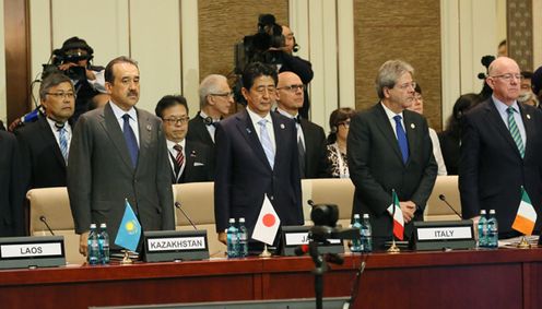 Photograph of the leaders observing a moment of silence for the victims of the incident in Nice, France, during the Opening Ceremony for the ASEM Summit Meeting