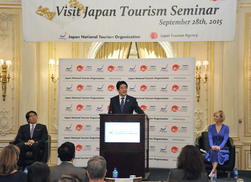 Photograph of the Prime Minister delivering an address at the Visit Japan Tourism Seminar hosted by JNTO