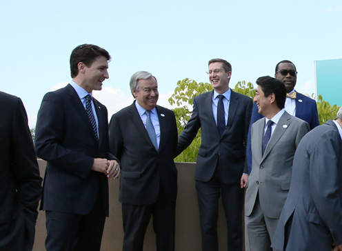 Photograph of the group photograph session with the leaders of the G7 members and invited outreach countries (2)