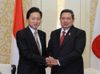 Photograph of Prime Minister Hatoyama shaking hands with President Yudhoyono of Indonesia