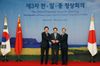 Photograph of Prime Minister Hatoyama shaking hands with President Lee and Premier Wen 1