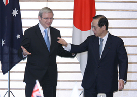 Photograph of the two leaders shaking hands at the joint press announcement