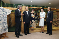Photograph of Prime Minister and Mrs. Fukuda observing the Hokkaido Information Center in the International Media Center
