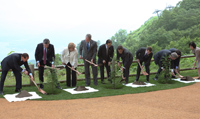 Photograph of the G8 leaders planting commemorative trees