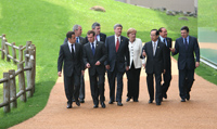 Photograph of the G8 leaders heading toward the commemorative tree planting ceremony and commemorative photograph session