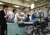 Photograph of the Prime Minister visiting a grinding and machining shop in Ota Ward, Tokyo