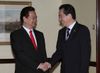 Photograph of Prime Minister Kan shaking hands with Prime Minister Dung of Viet Nam