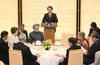 Photograph of Prime Minister Kan delivering an address at the banquet