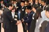 Photograph of the Prime Minister shaking hands with the representatives of the youths participating in the SSEAYP and giving words of encouragement to them
