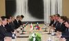 Photograph of Prime Minister Kan holding talks with President Medvedev of Russia and Russian delegates
