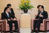 Photograph of Prime Minister Kan meeting with Permanent Member of the Secretariat of the Communist Party of Viet Nam Central Committee Truong Tan Sang 1