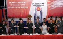 Photograph of the leaders clasping hands after the signing ceremony of the Kuala Lumpur Declaration on the ASEAN Plus Three Summit