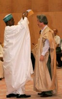 Photograph of Prime Minister dressed in an ethnic garment presented by the Ambassador of Nigeria