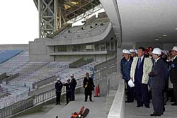 Prime Minister Mori observes the construction site of the Saitama Stadium 2002. The Stadium will have the seating capacity of 63,700.