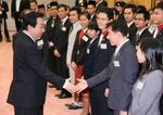 Photograph of the Prime Minister shaking hands with and giving words of encouragement to the representatives of the youths participating in the SSEAYP