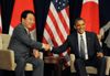 Photograph of Prime Minister Noda shaking hands with President Barack Obama at the Japan-US Summit Meeting