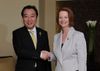 Photograph of Prime Minister Noda shaking hands with Prime Minister Julia Gillard before the Japan-Australia Summit Meeting