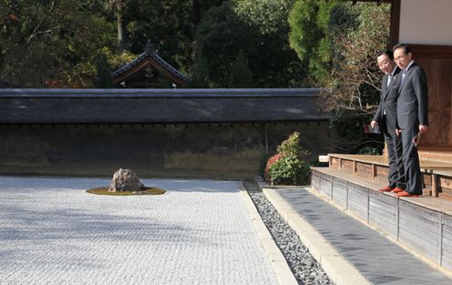 Photograph of the leaders taking a stroll in the Rock Garden of Ryoanji Temple