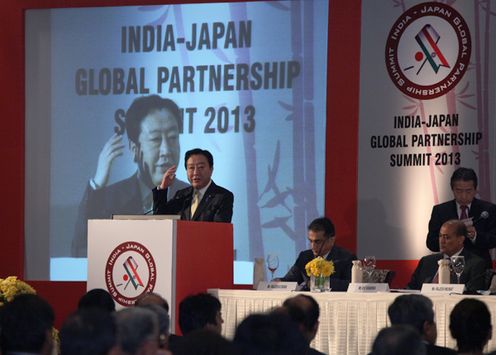 Photograph of the Prime Minister delivering an address at an event related to the India-Japan Global Partnership Summit 2013 1