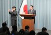 Photograph of Chief Cabinet Secretary Osamu Fujimura announcing the list of Cabinet members