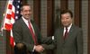Photograph of Prime Minister Noda shaking hands with President of the American Chamber of Commerce in Japan (ACCJ) Michael Alfant