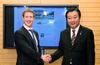 Photograph of Prime Minister Noda shaking hands with Facebook Founder and CEO Mark Zuckerberg 1
