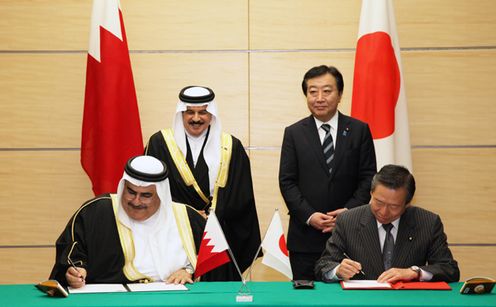 Photograph of the leaders attending a signing ceremony